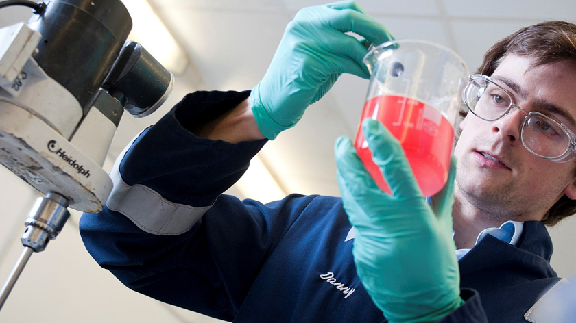 Aubin Group team member working in a lab