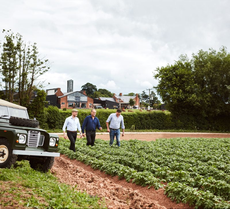 Chase family in the potato fields at Chase Distillery