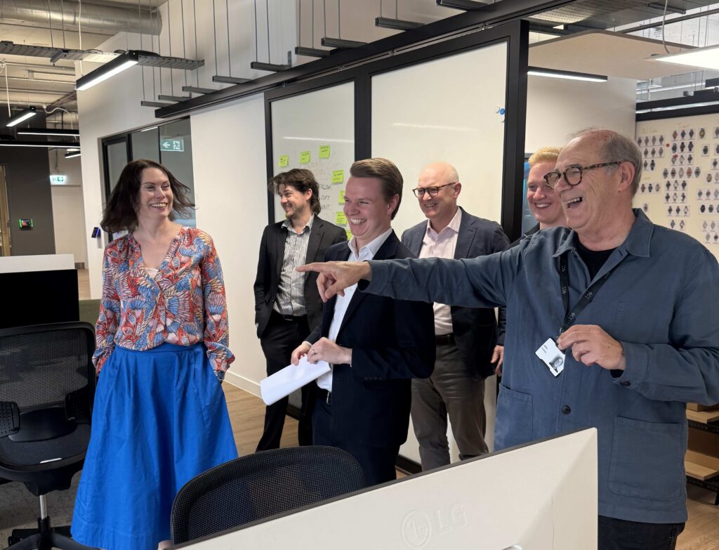 Christopher Ward MP visit group shot in office space